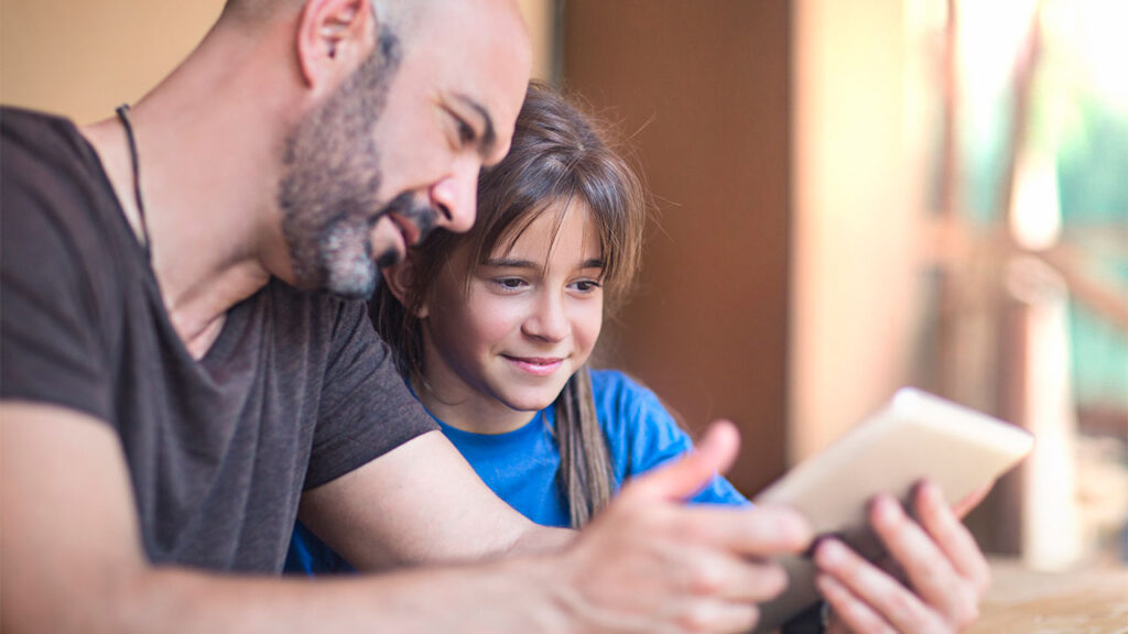 Healthy technology use for children. Father with his daughter